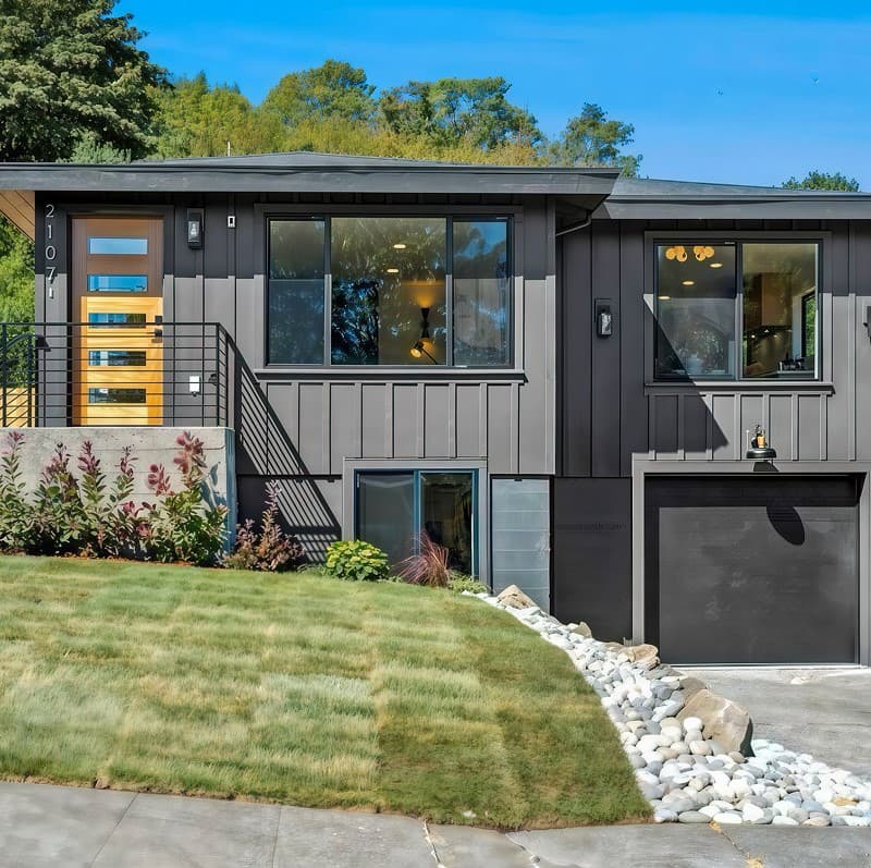 Dark modern siding under roof eave